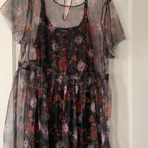 Black Cami dress with floral overlay .
